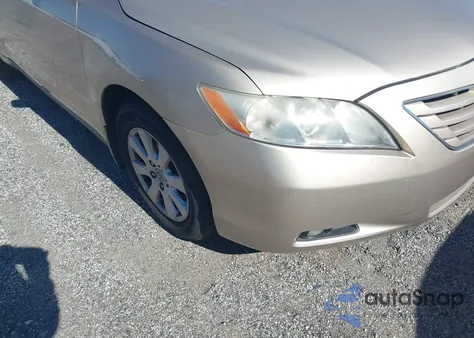 2009 Toyota Camry Xle z USA, uszkodzony, nr VIN 4T1BE46K89U369409